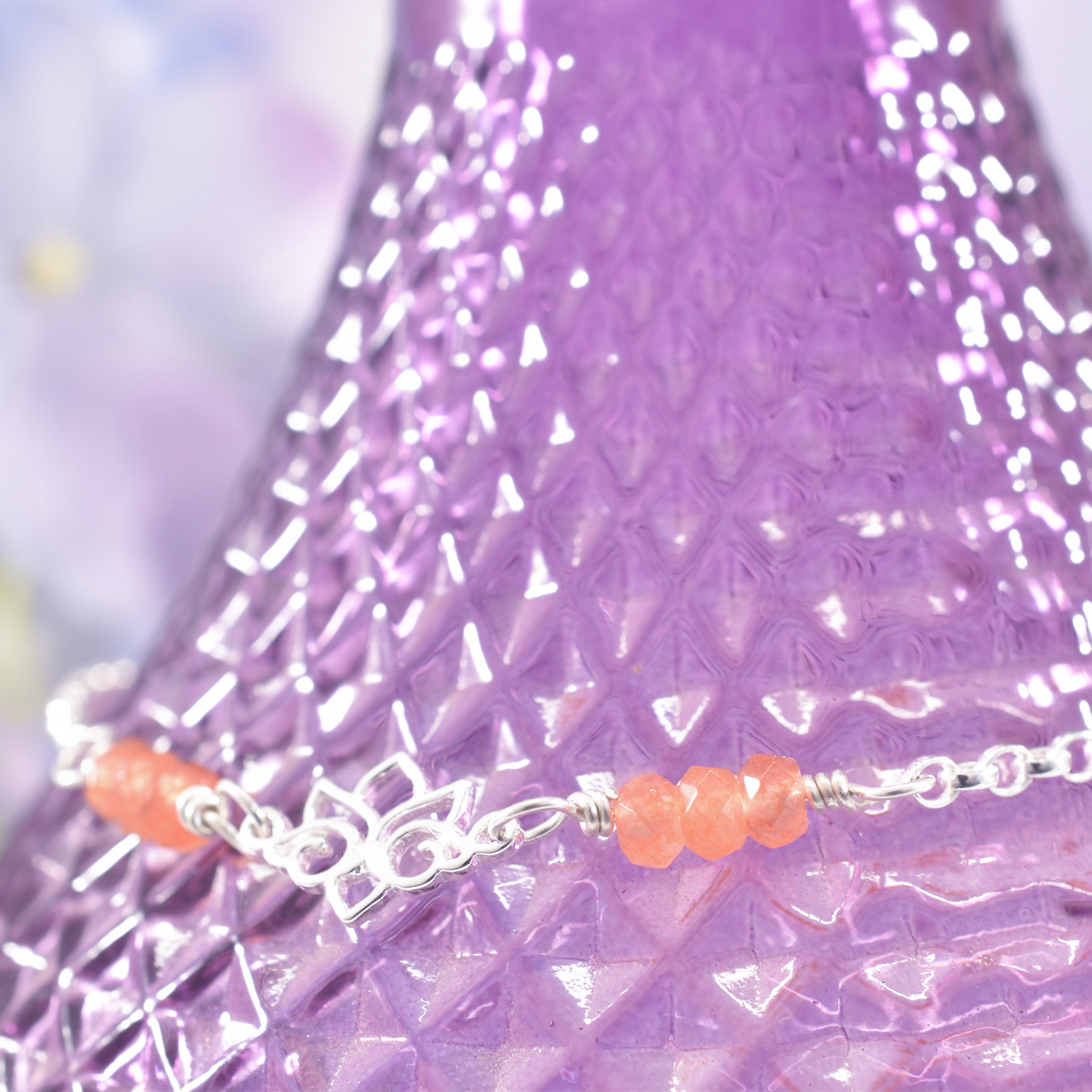 Chain Anklet featuring a lotus flower central charm, extension chain and orange agate gemstone beads to the front and back