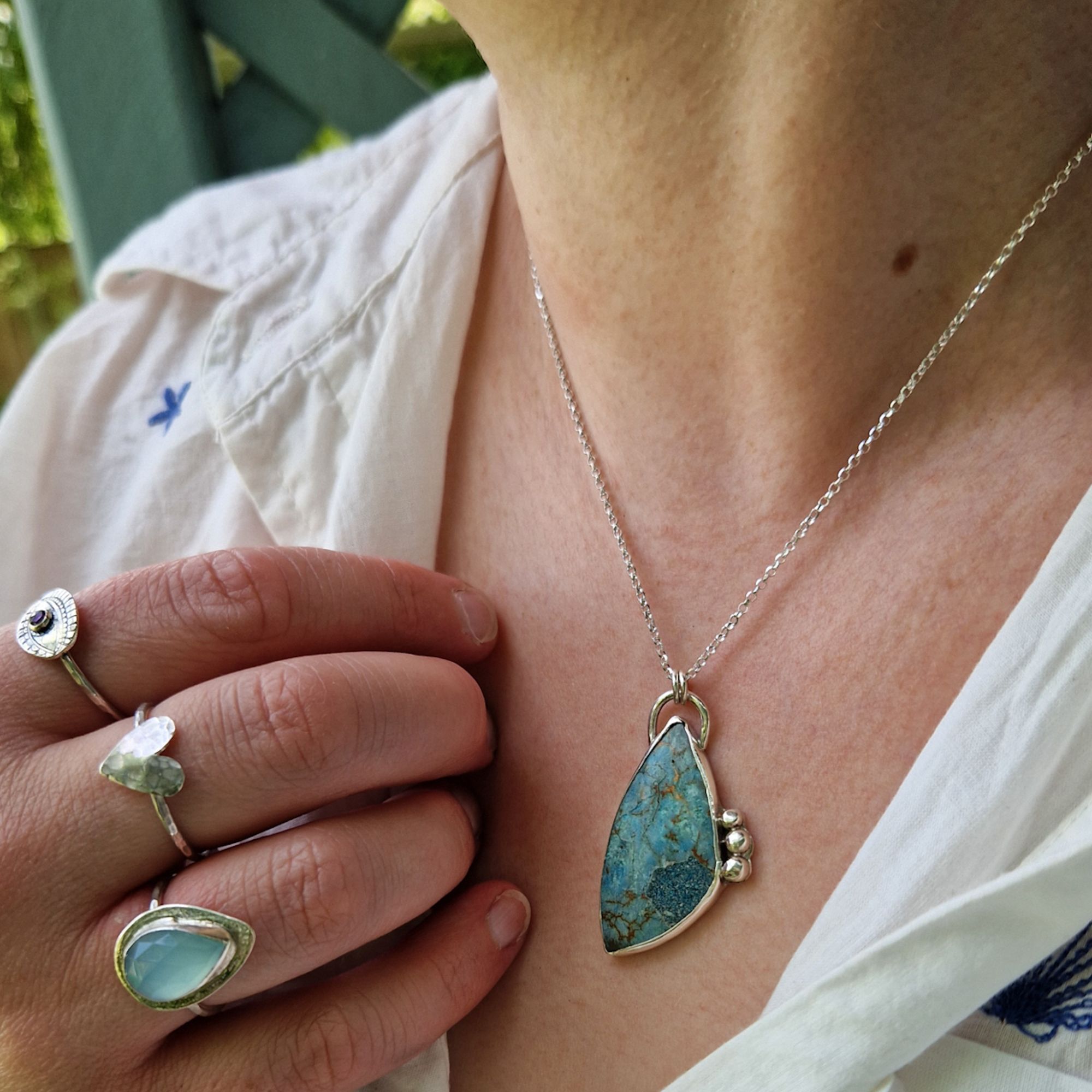 Sea Sediment Jasper pendant shown on model with 18" chain